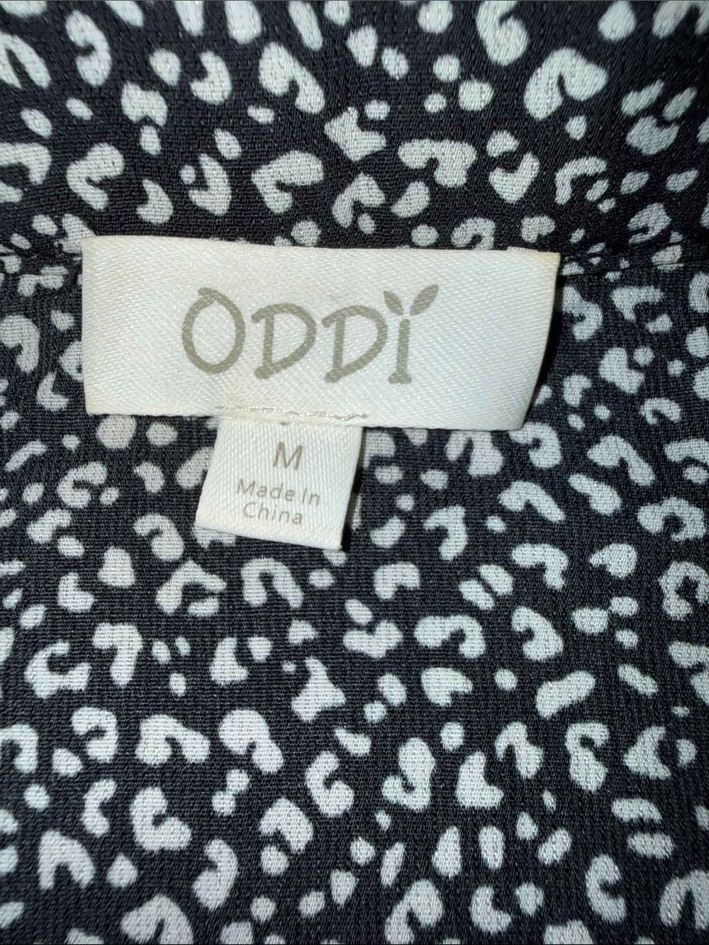 Leopard Print Button-Up Blouse in Tan and Black - Picture 2 of 10